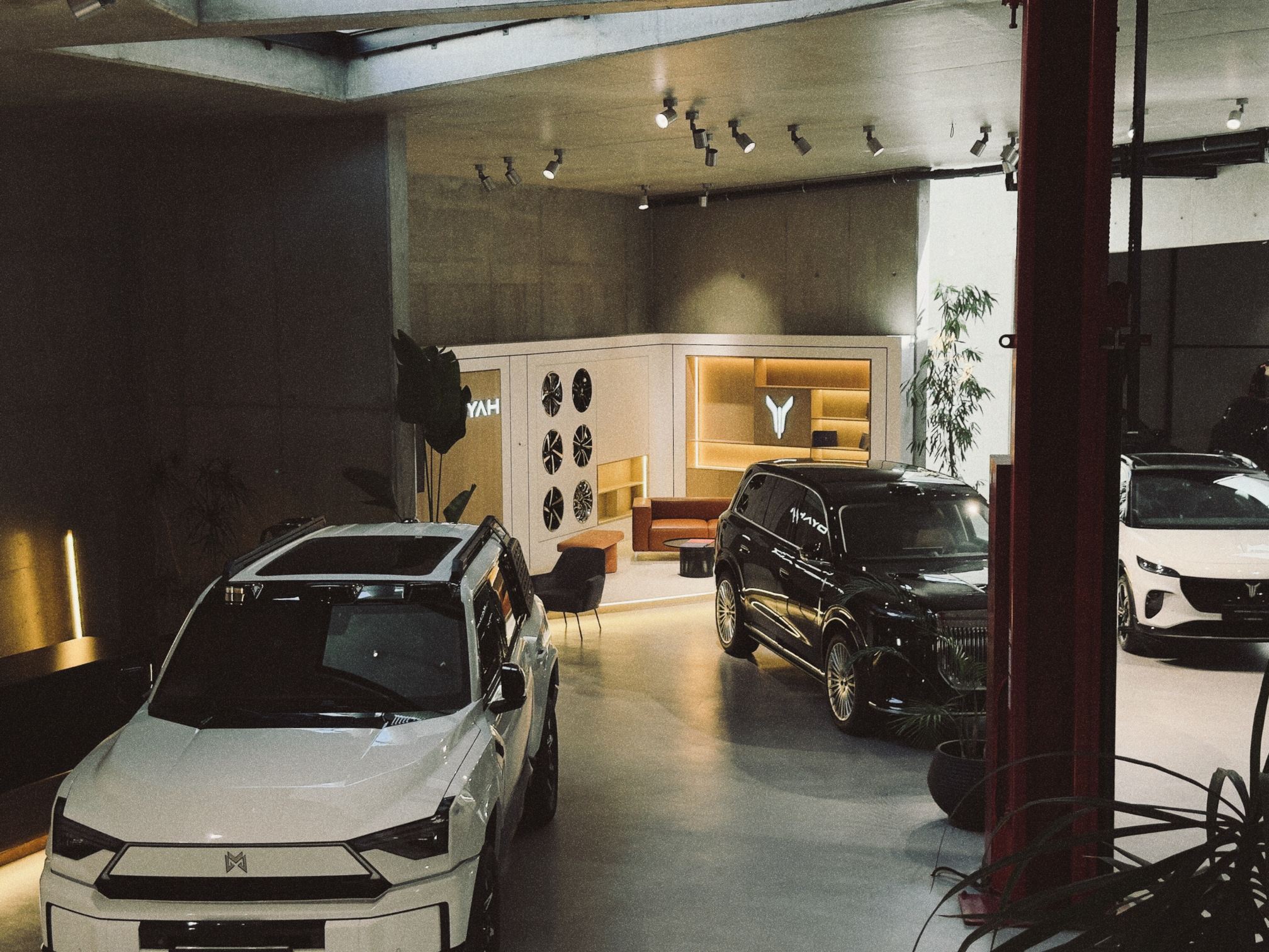 MHERO and VOYAH vehicles inside the Monza SAL showroom in Beirut